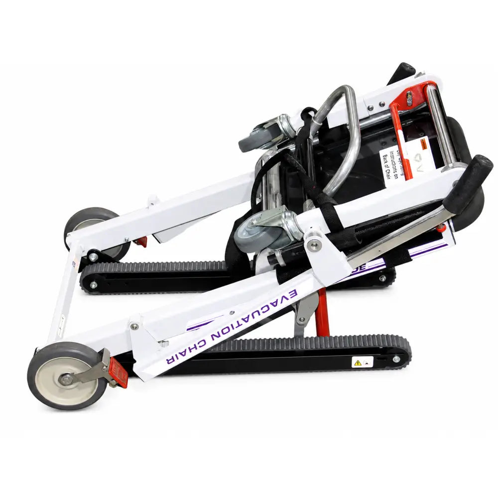 Ferno model 59-t ez-glide evacuation stair chair with white and black frame, red accents, metal frame, and rubber wheels