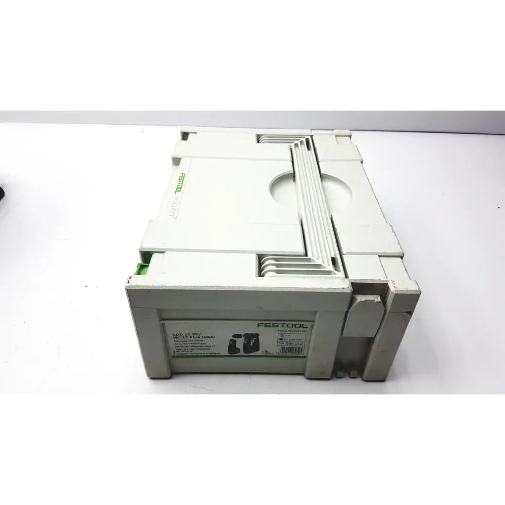 White plastic festool dd-es storage box with molded compartments and green branding for plus drill attachments