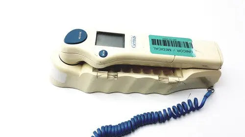 Beige plastic digital thermometer with blue buttons and coiled cord for accurate readings in firsttemp genius calibrator