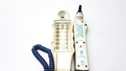 Cream-colored lexicon telephone handset with coiled blue cord and modular jack tool for firsttemp genius calibrator reuse medical use