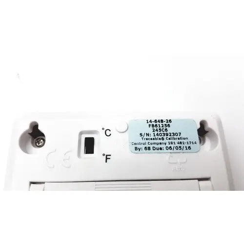 White plastic fisher brand traceable thermostat with light blue label showing serial and calibration details