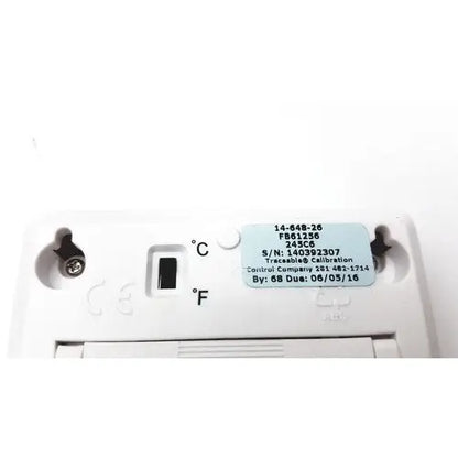 White plastic fisher brand traceable thermostat with light blue label showing serial and calibration details