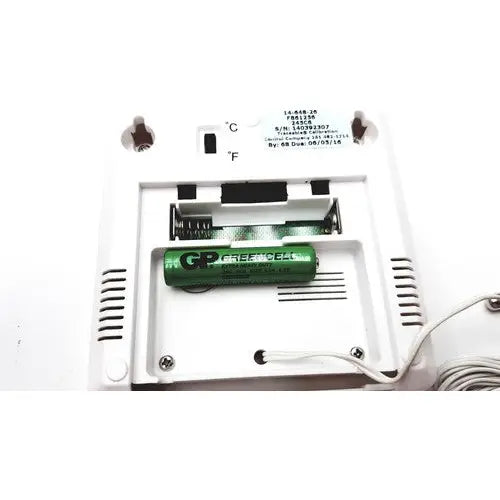 Green gp greencell battery nestled in white plastic compartment of fisher brand traceable thermometer product