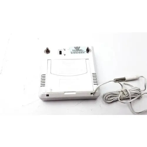 White plastic digital thermometer with coiled gray cable and display switch from fisher brand traceable thermometer