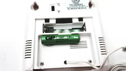 Green gp greencell battery nestled in white plastic compartment of fisher brand traceable thermometer product