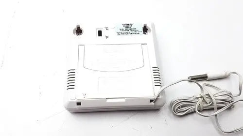White plastic digital thermometer with coiled gray cable and display switch from fisher brand traceable thermometer