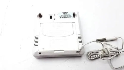 White plastic digital thermometer with coiled gray cable and display switch from fisher brand traceable thermometer
