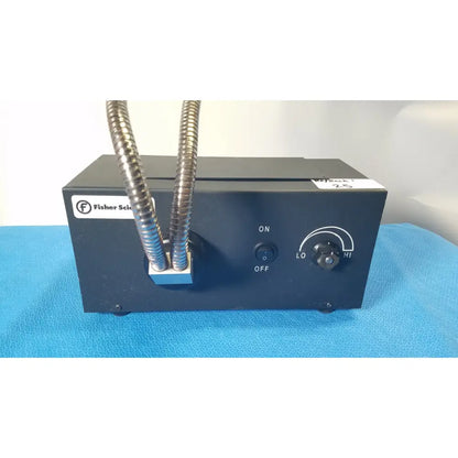 Black rectangular Fisher Scientific dual fiber-optic illuminator with two metallic corrugated tubes on top