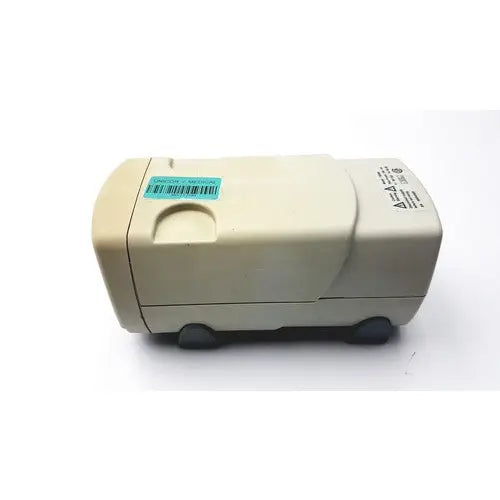 Beige plastic electric pencil sharpener with black rubber feet and barcode sticker related to fisher scientific fb300 electrophoresis power supply