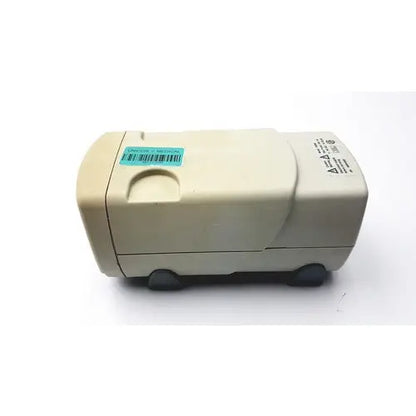 Beige plastic electric pencil sharpener with black rubber feet and barcode sticker related to fisher scientific fb300 electrophoresis power supply