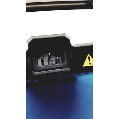 Back side of fisher scientific isotemp digital hotplate showing black plastic electrical connector with yellow warning triangle
