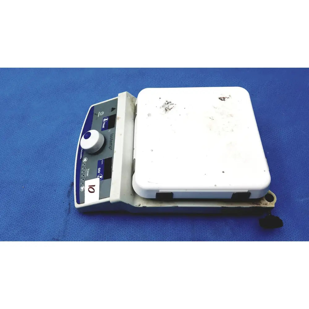 White rectangular fisher scientific isotemp digital hotplate stirrer with gray control panel showing signs of use