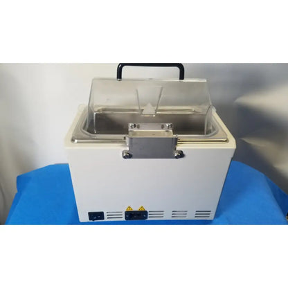 Fisher Scientific Isotemp white rectangular laboratory-grade water bath with transparent lid and black handle