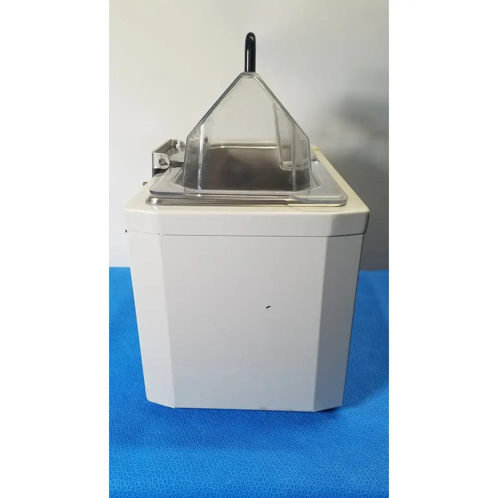 White octagonal ice cream maker with clear plastic lid and black handle by fisher scientific isotemp water bath laboratory