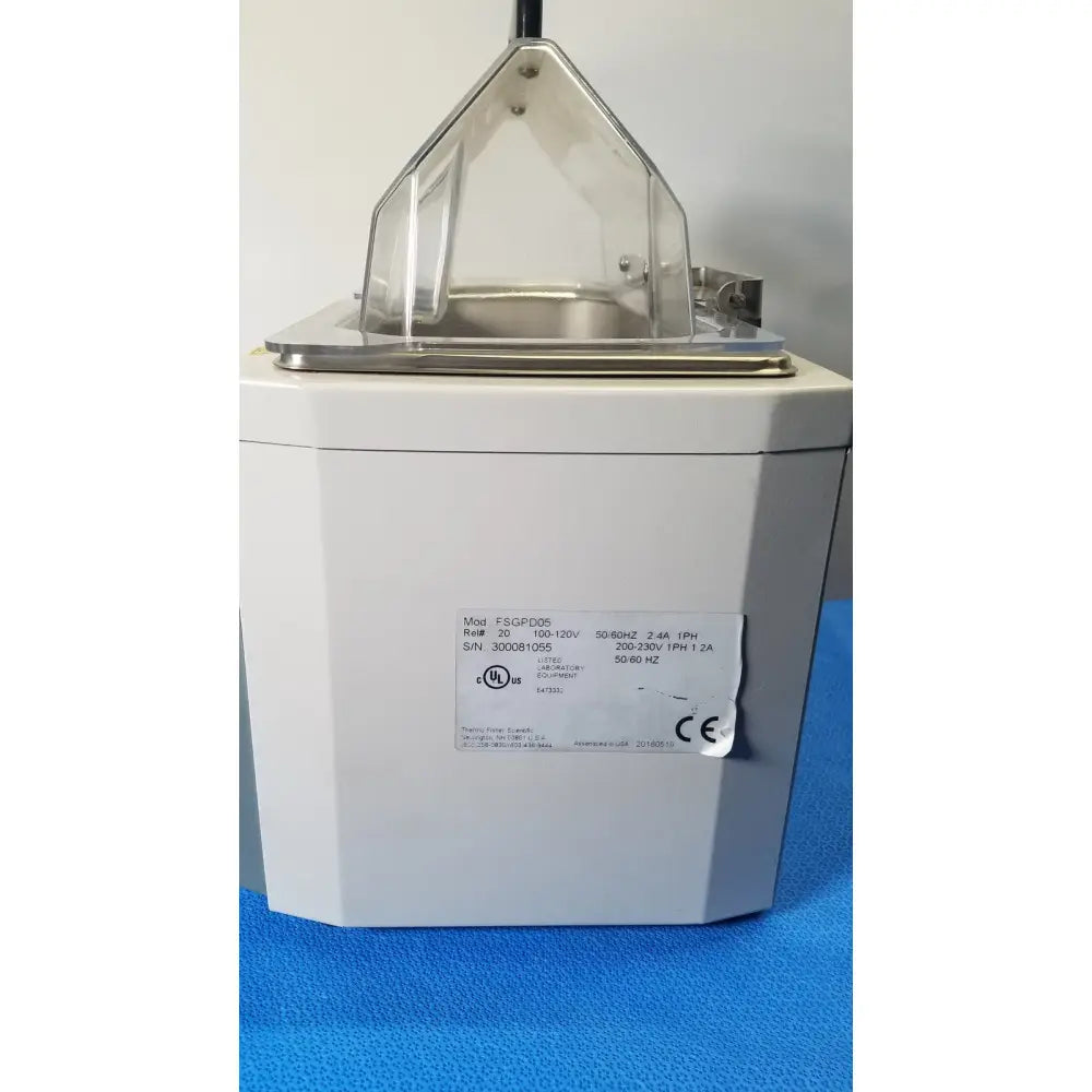 White rectangular laboratory centrifuge with clear plastic lid and stainless steel interior by fisher scientific isotemp gpd