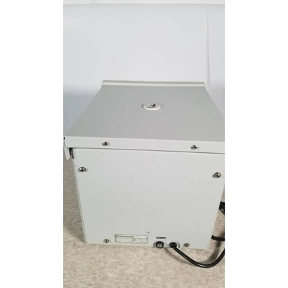 White metal industrial box with circular logo and screws on edges of fisher scientific marathon 16km benchtop 60hz