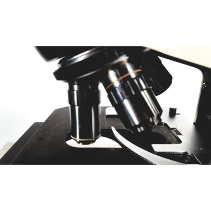 Black Fisher Scientific MicroMaster microscope with metallic lenses and precision stage model 12-561-3faz