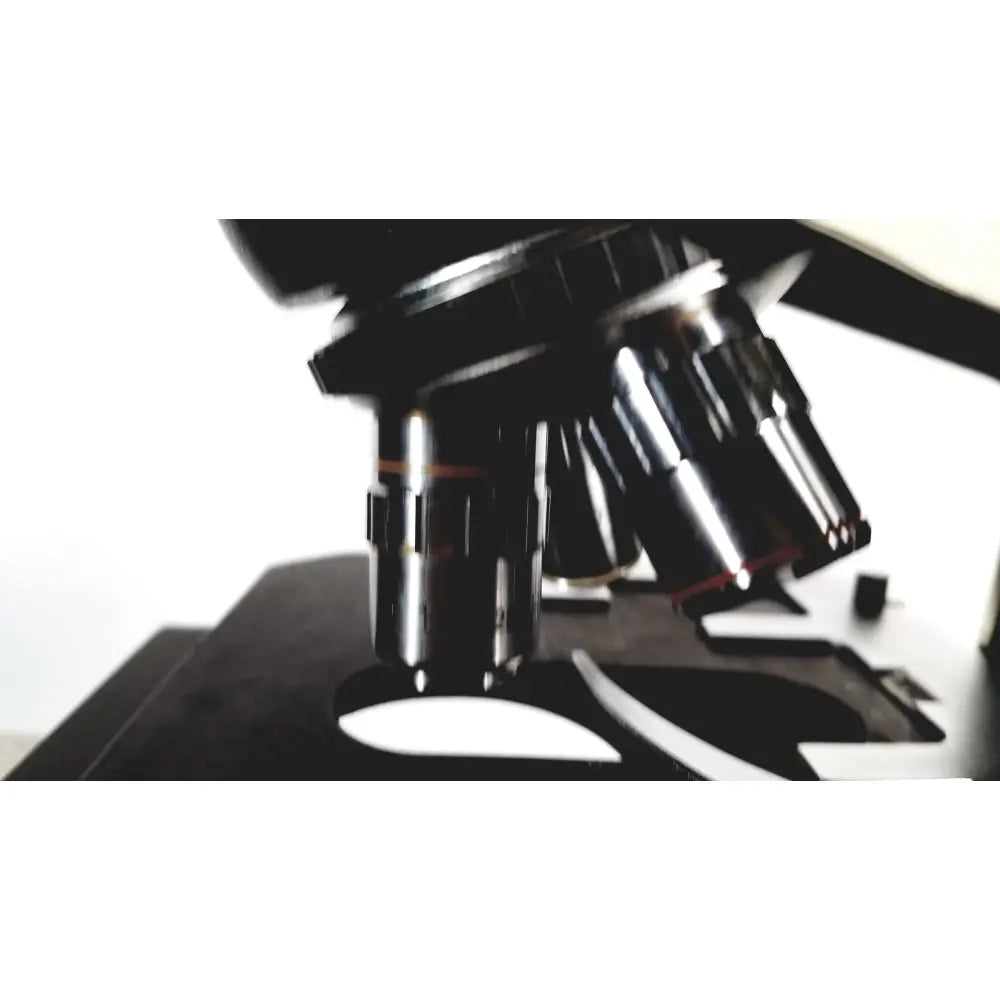 Black metal fisher scientific micromaster microscope with multiple objective lenses and specimen stage 12-561-3faz