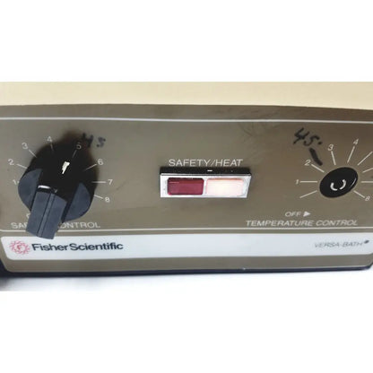 Fisher Scientific versa-bath heated water bath control panel with black rotary dials and red safety heat switch