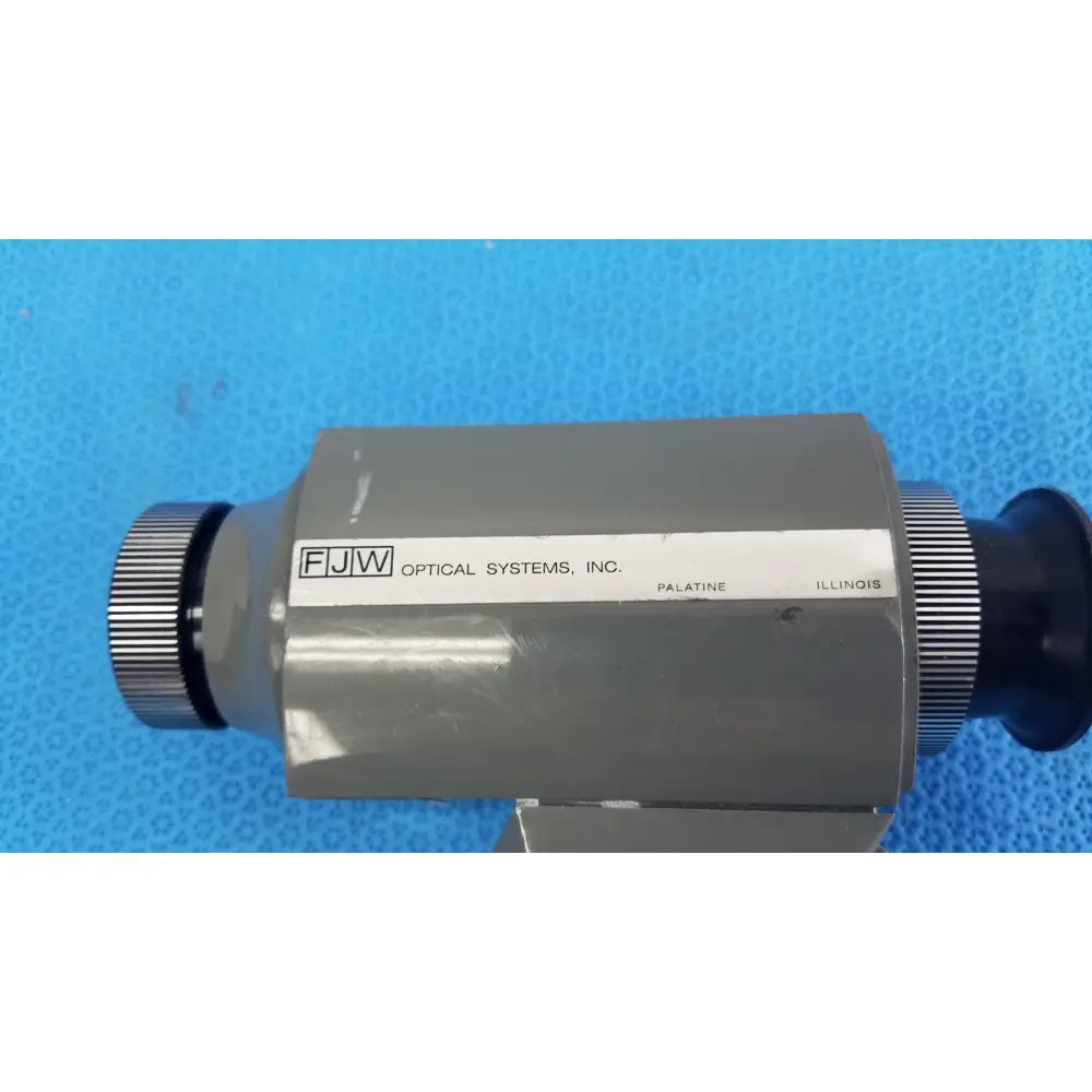 Gray metallic cylindrical infrared viewer with black knobs and white label from fjw optical systems inc optical systems