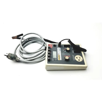 Fluke 180 electrical safety analyzer with Fluke 702a test instrument, gray coiled cable, multiple ports, and lcd screen