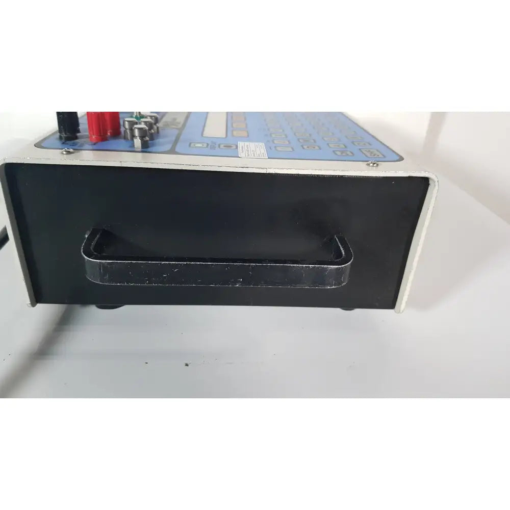 Black plastic fluke biomedical medtester 5000c automated electrical safety analyzer with silver handle and blue control panel