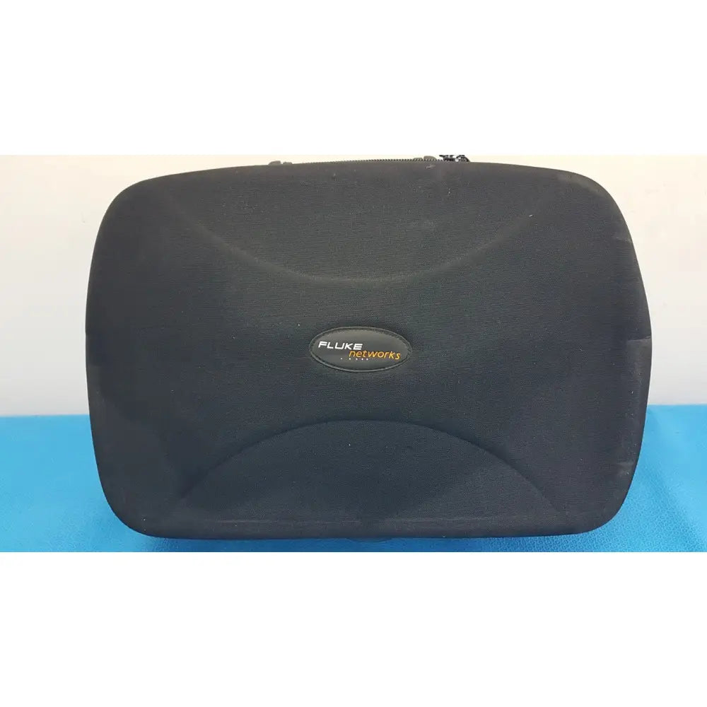 Black fluke networks hard-shell carrying case with textured surface and embossed logo for network cable certifier cable analyzer