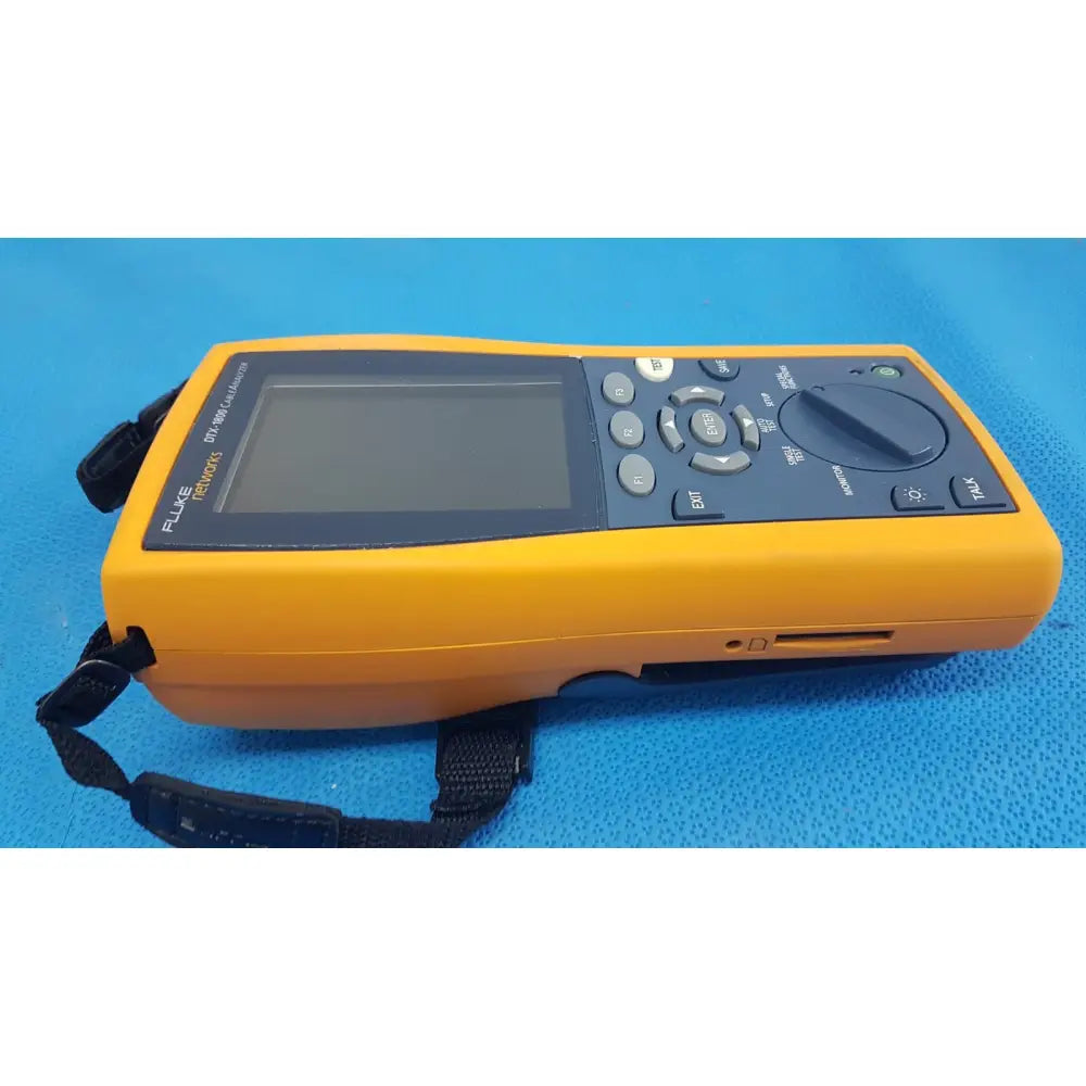 Yellow Fluke 1587c handheld digital multimeter with gray buttons and rotary dial for network cable certifier use