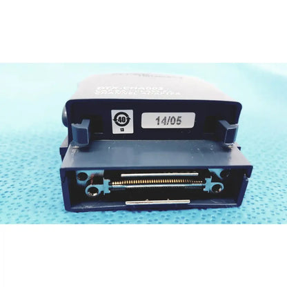 Black plastic cat5e to rj45 channel adapter with gold pins and label on fluke dtx-1800 network cable certifier cable analyzer