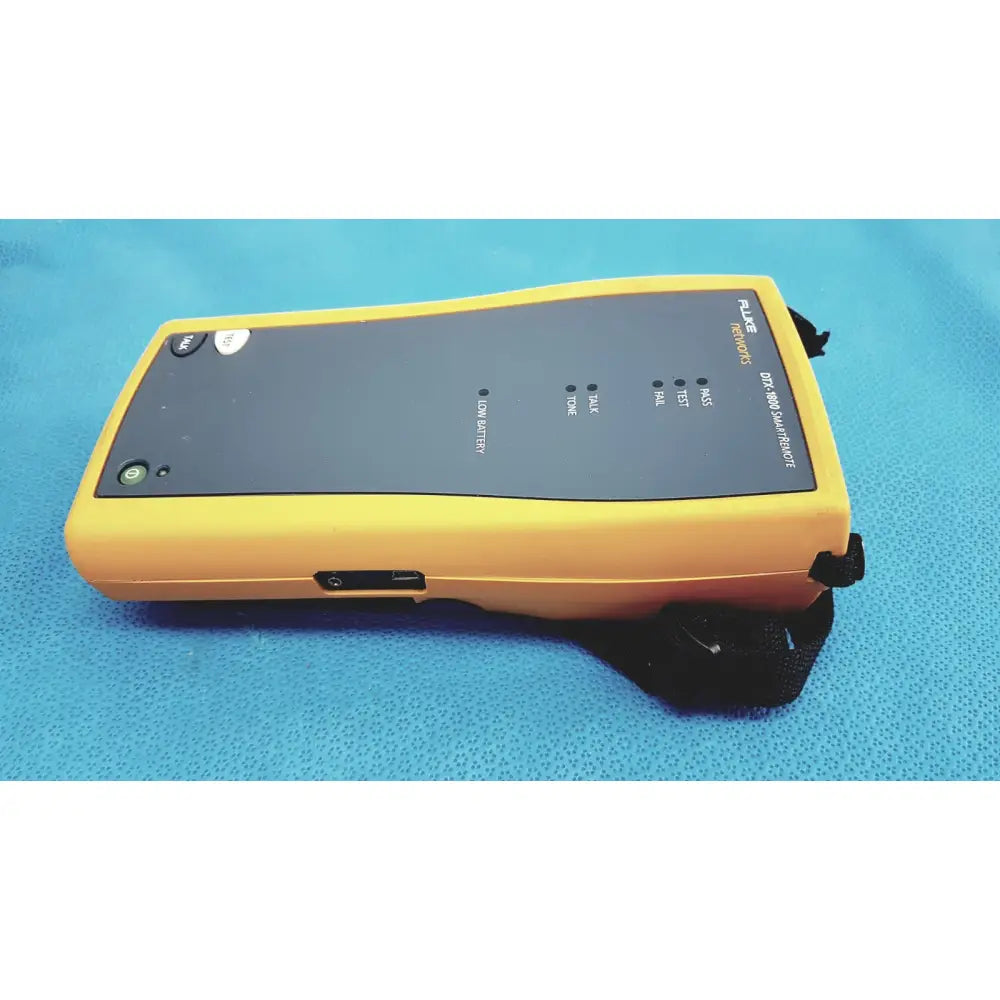 Yellow fluke dtx-380 smartmeter with black control panel and buttons used as a network cable certifier and cable analyzer