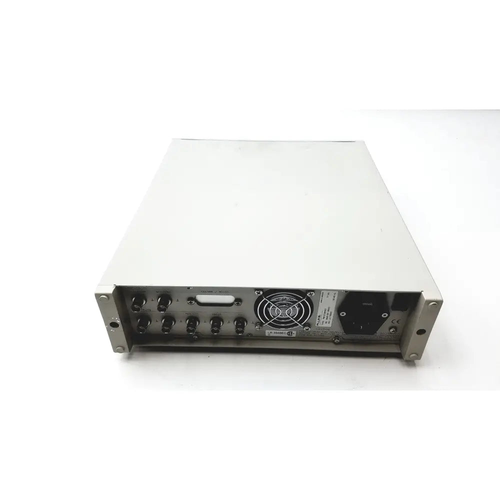 Rear panel of silver metallic rack-mountable fluke pm5139 function generator with multiple ports and fan grille