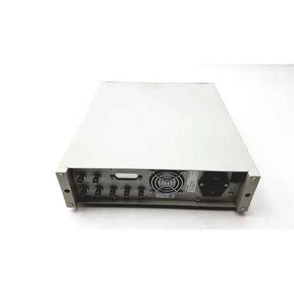 Rear panel of silver metallic rack-mountable fluke pm5139 function generator with multiple ports and fan grille