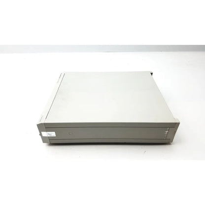 Gray metal server rack with sleek rectangular design and subtle branding shown with fluke pm5139 function generator