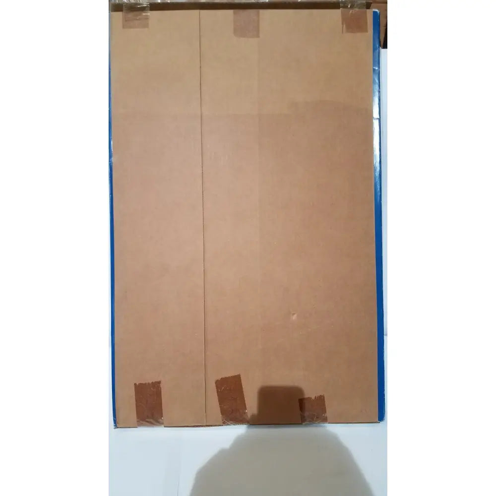 Two brown cardboard panels taped together representing the back side of the freedom grip plus bed handle patient support aid