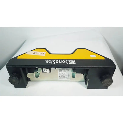 Fuji film sonosite power pack dock featuring a black and yellow sonosite ultrasound machine with a sturdy rectangular design