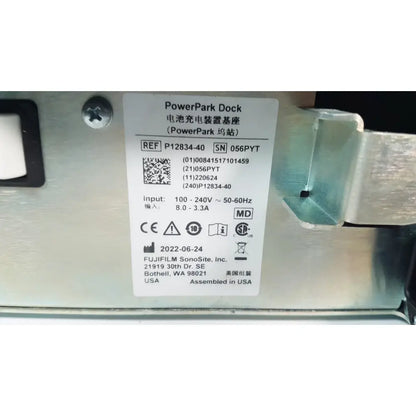 Silver metallic fuji film sonosite power pack dock battery charging station base with technical specifications label