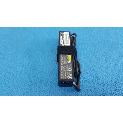 Black plastic fujitsu ac adapter power supply 19v 3.16a with coiled cable and black velcro strap for laptops