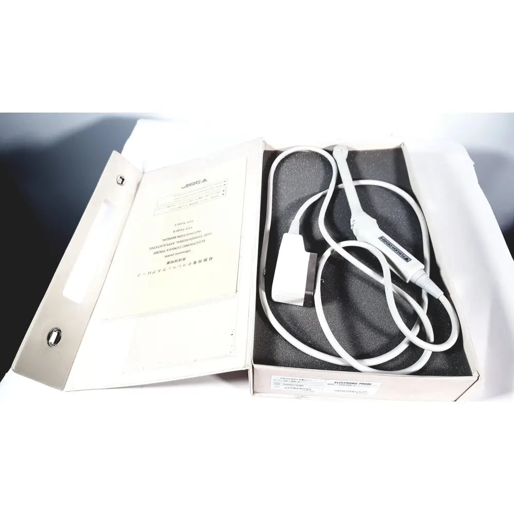 White electronic fukuda denshi ultrasound probe trans vaginal with flexible cable and ergonomic handle neatly coiled in packaging