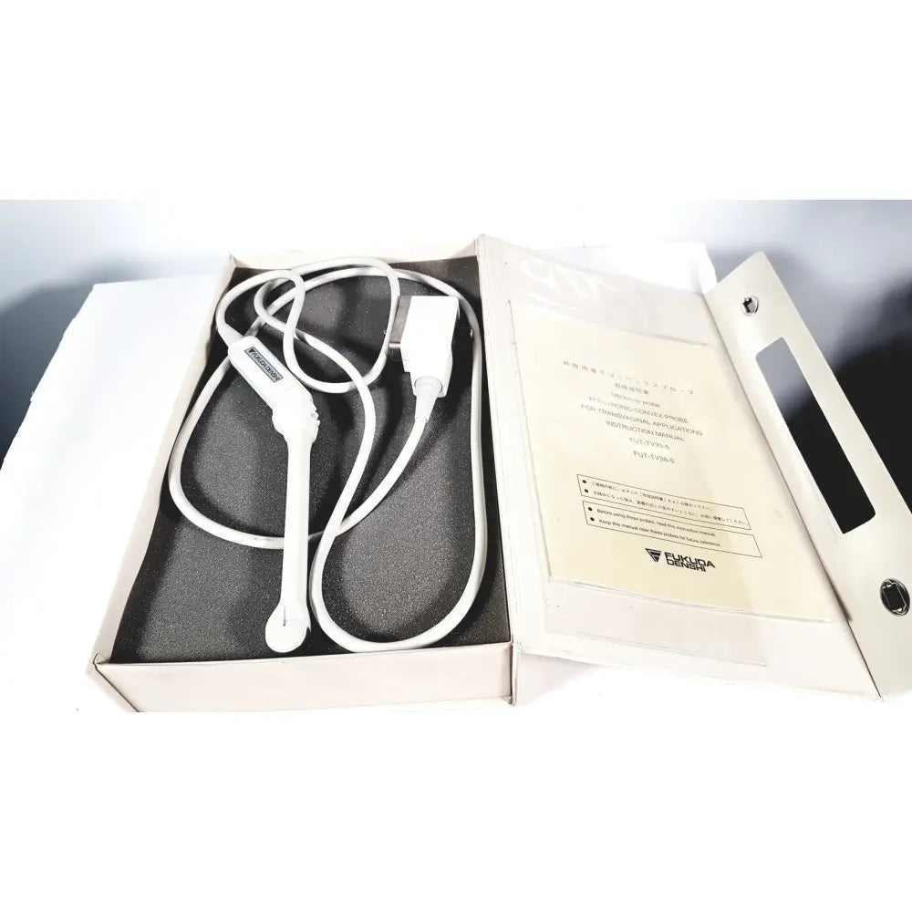 White plastic fukuda denshi ultrasound probe trans vaginal with coiled cable and connector in original packaging