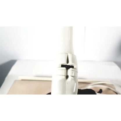White plastic hair dryer nozzle with black rubber seal and metallic hinge detail for fukuda denshi ultrasound probe trans vaginal use