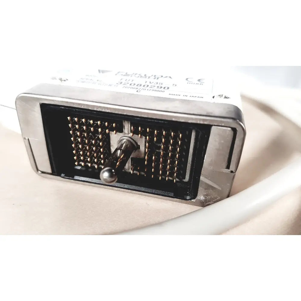 Silver-colored metal relay with gold-plated contacts and central toggle switch labeled furukawa for fukuda denshi ultrasound probe trans vaginal use