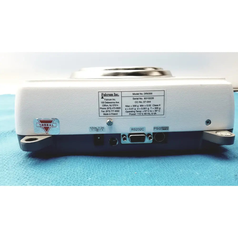 White plastic fulcrum torbal drx300 scale balance with black base and silver metal components max 300g accuracy 0.02g