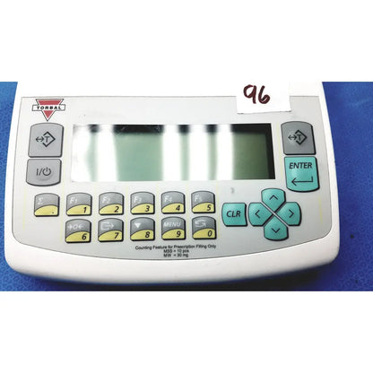 White torbal prescription filling machine control panel with gray teal yellow keys and display for fulcrum torbal drx300 scale balance