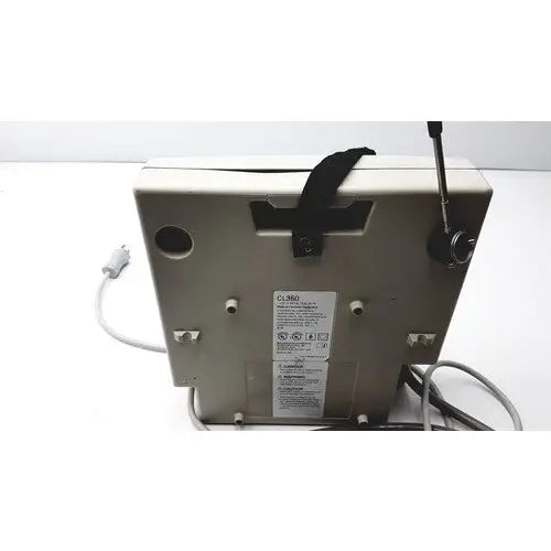 Beige plastic gaymar spr plus iii computer monitor with black strap and antenna for medical use