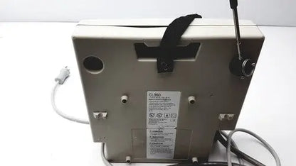Beige plastic gaymar spr plus iii computer monitor with black strap and antenna for medical use