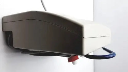 Beige plastic wall-mounted water dispenser with red and white valve for Gaymar SPR plus III cooling therapy unit