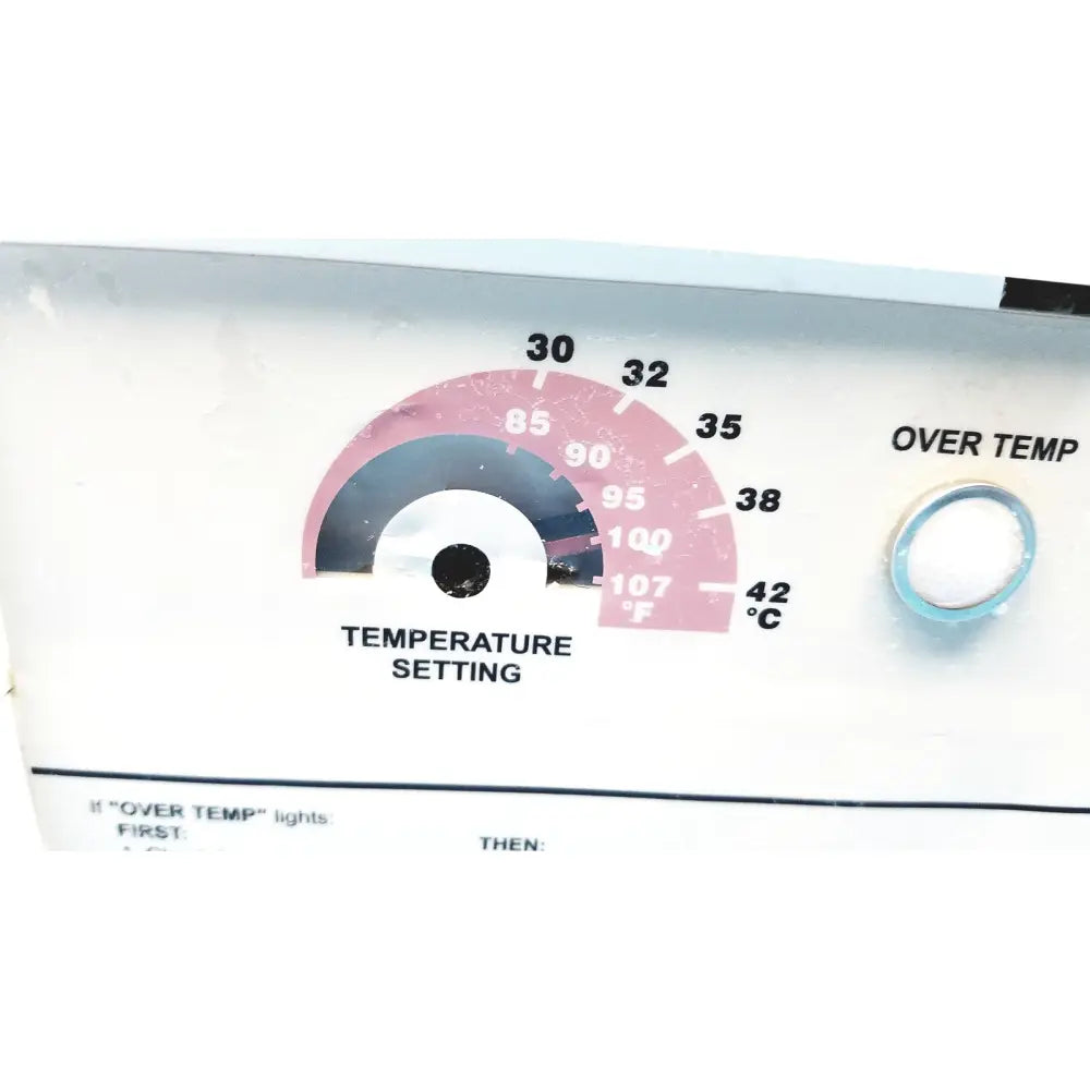 White plastic temperature dial with pink and gray fahrenheit celsius markings on gaymar t pump tp500c heat therapy pump