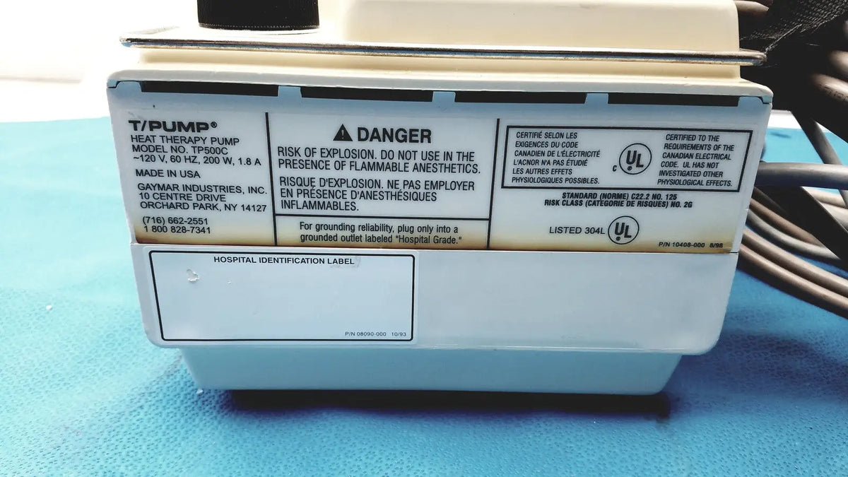 White rectangular gaymar t pump heat therapy pump tp500c with black and beige labeling by gaymar industries inc