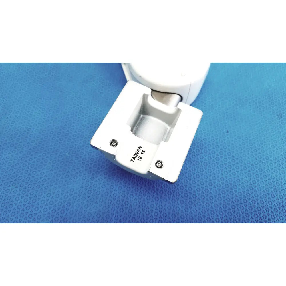 White plastic hinge with metallic silver pivot and taiwan 16/8 engraving on base of gcx vhm variable height arm