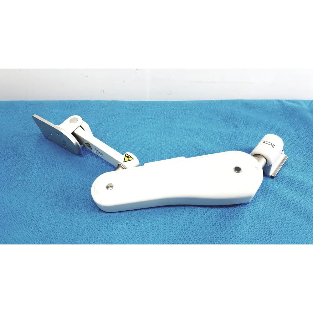 White ergonomic gcx vhm variable height arm rest with silver metallic joints and branded 3cx logo on adjustable clamp